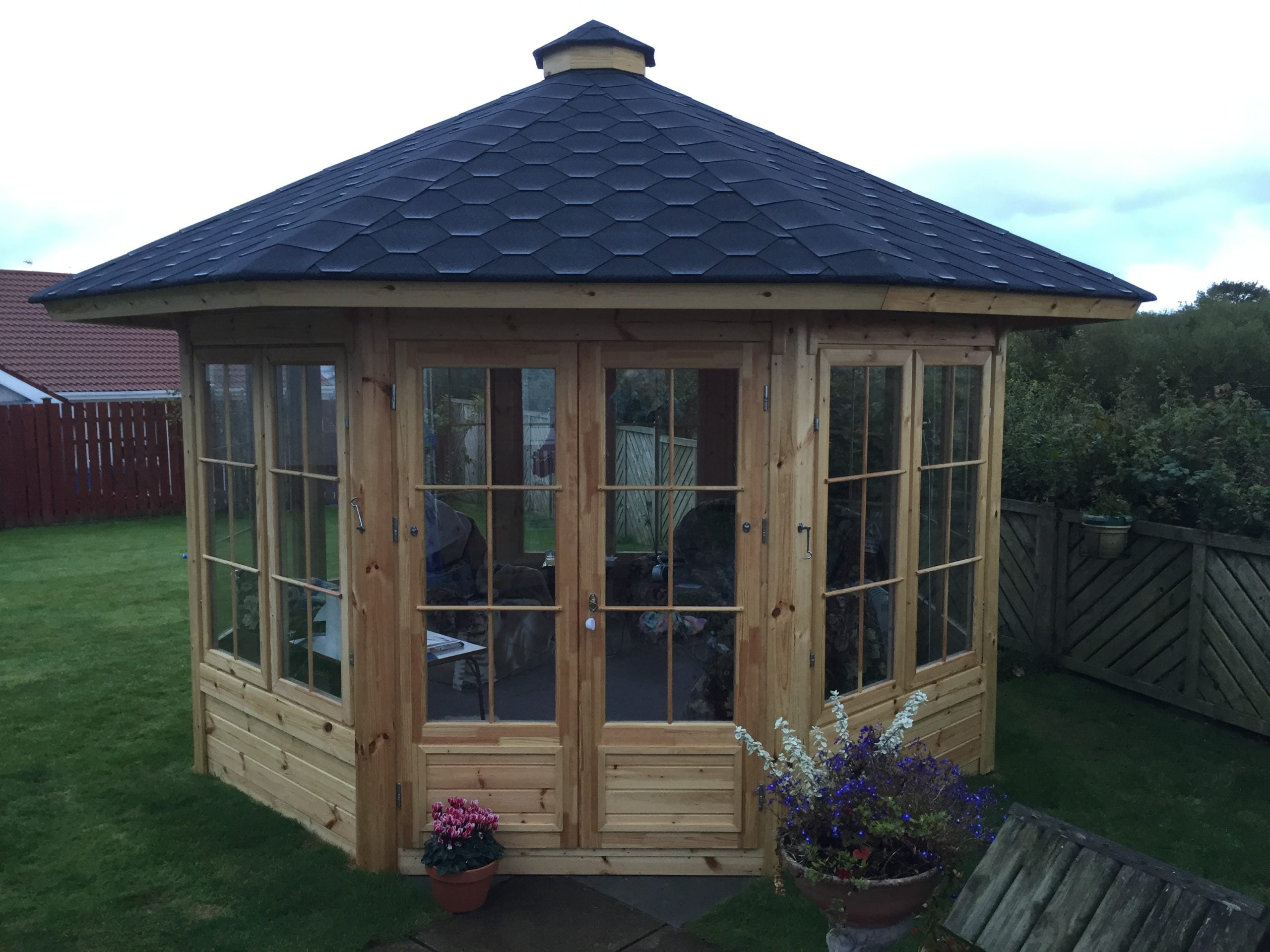Garden room that is placed within a garden.